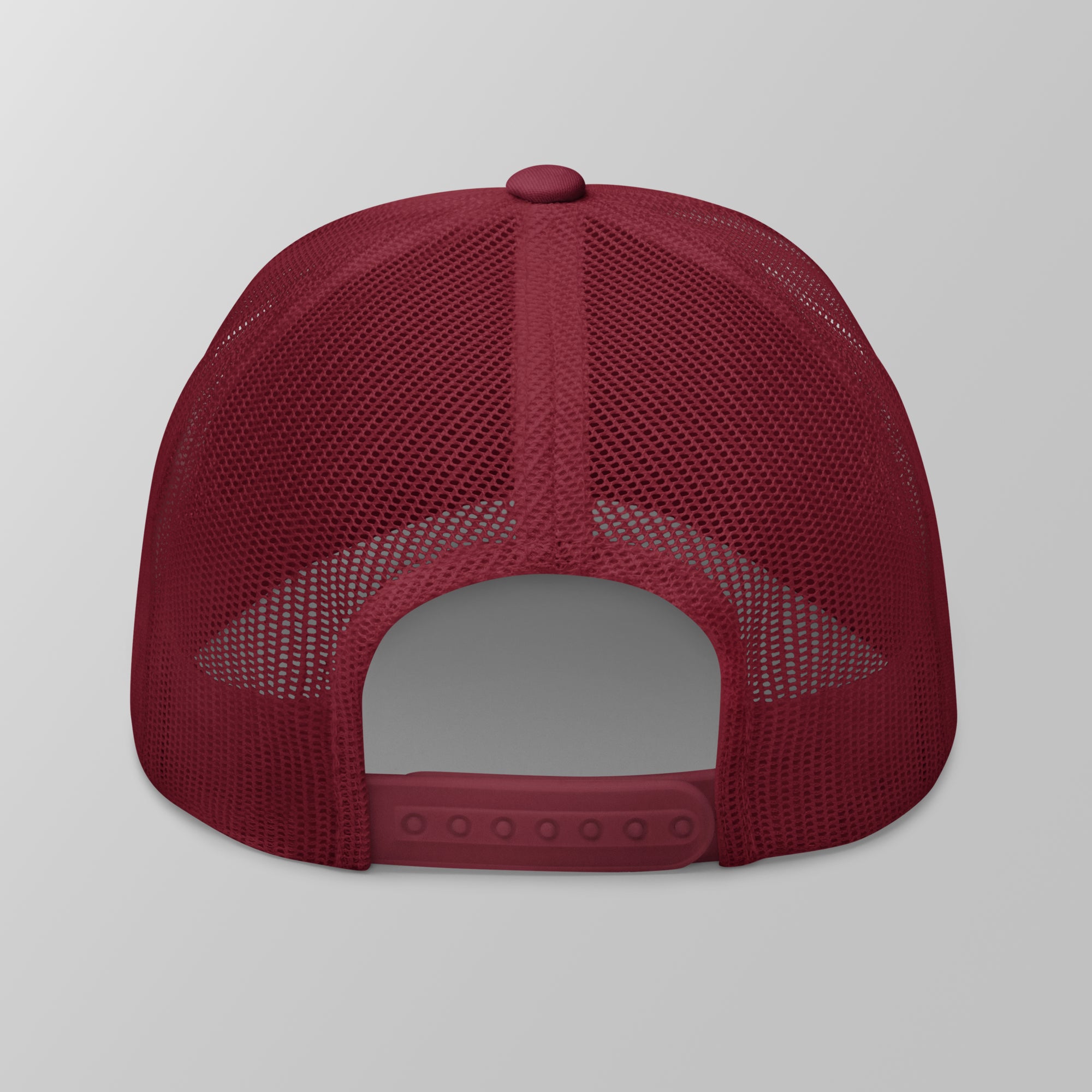 Back view of a maroon premium padel trucker cap with a breathable mesh back and adjustable snapback strap.