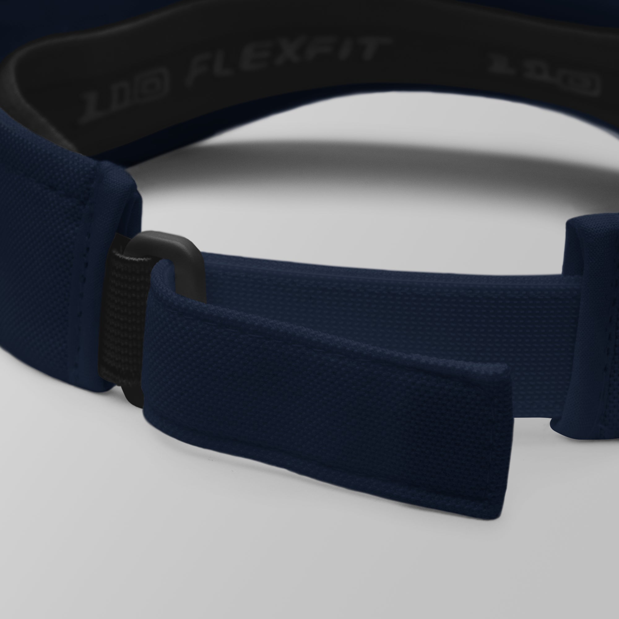 Back view of a navy blue premium padel visor showing the adjustable strap.
