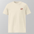 Front view of a cream relaxed fit oversized unisex padel t-shirt with a small red logo on the left chest.