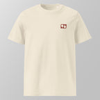 Front view of a cream relaxed fit oversized unisex padel t-shirt with a small red logo on the left chest.