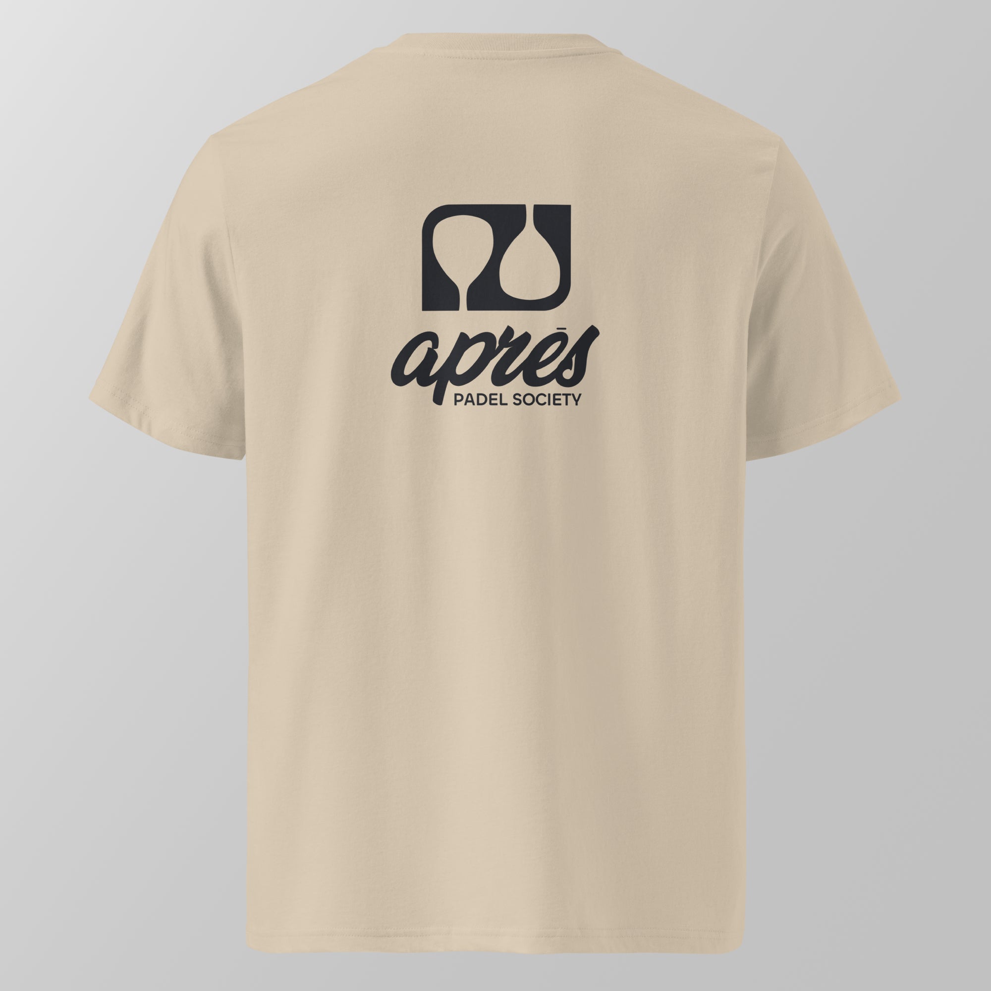 Back view of an ecru relaxed fit oversized unisex padel t-shirt with the large black 'Après Padel Society' logo. 