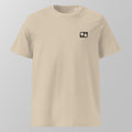 Front view of an ecru relaxed fit oversized unisex padel t-shirt with a small black logo on the left chest.