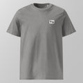 Front view of a heather grey relaxed fit oversized unisex padel t-shirt with a small white logo on the left chest.