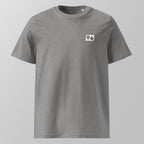 Front view of a heather grey relaxed fit oversized unisex padel t-shirt with a small white logo on the left chest.