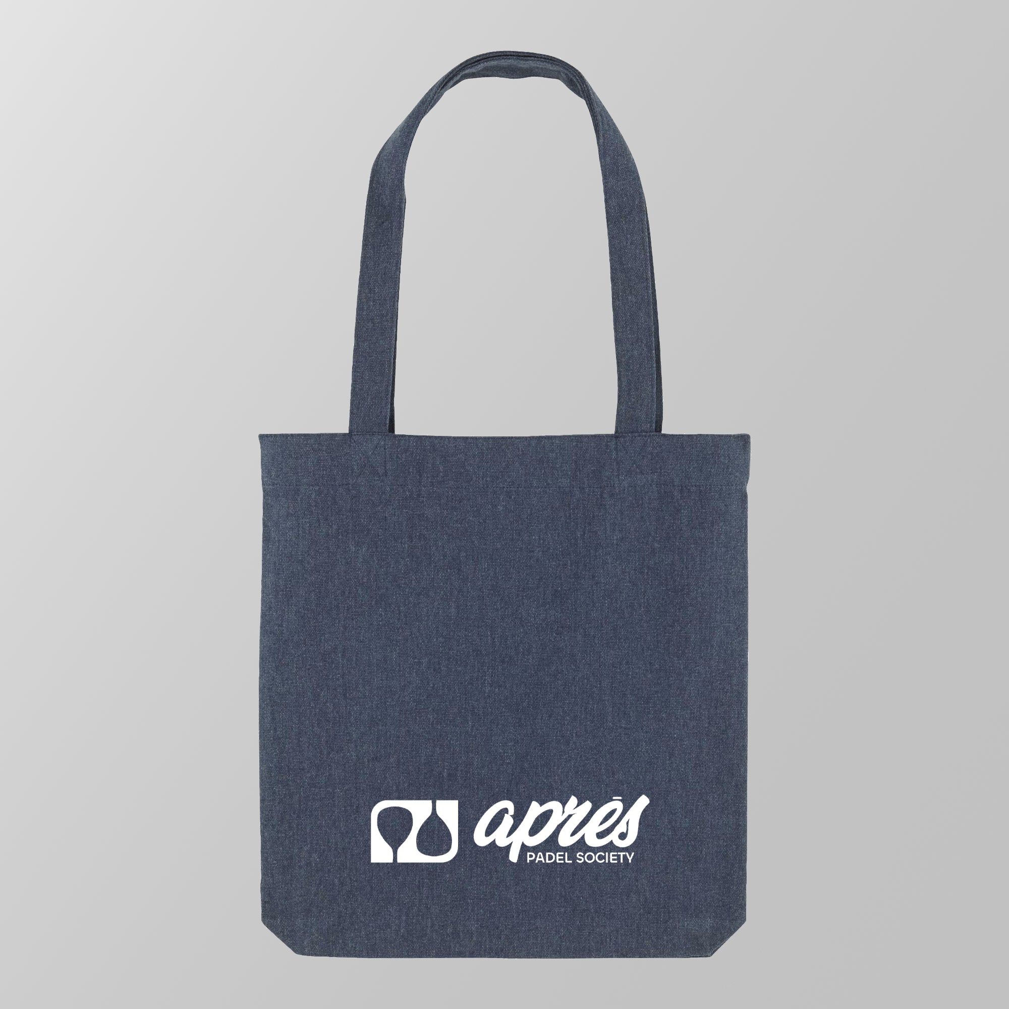 Front view of a premium navy padel tote bag with the white 'Après Padel Society' logo. 