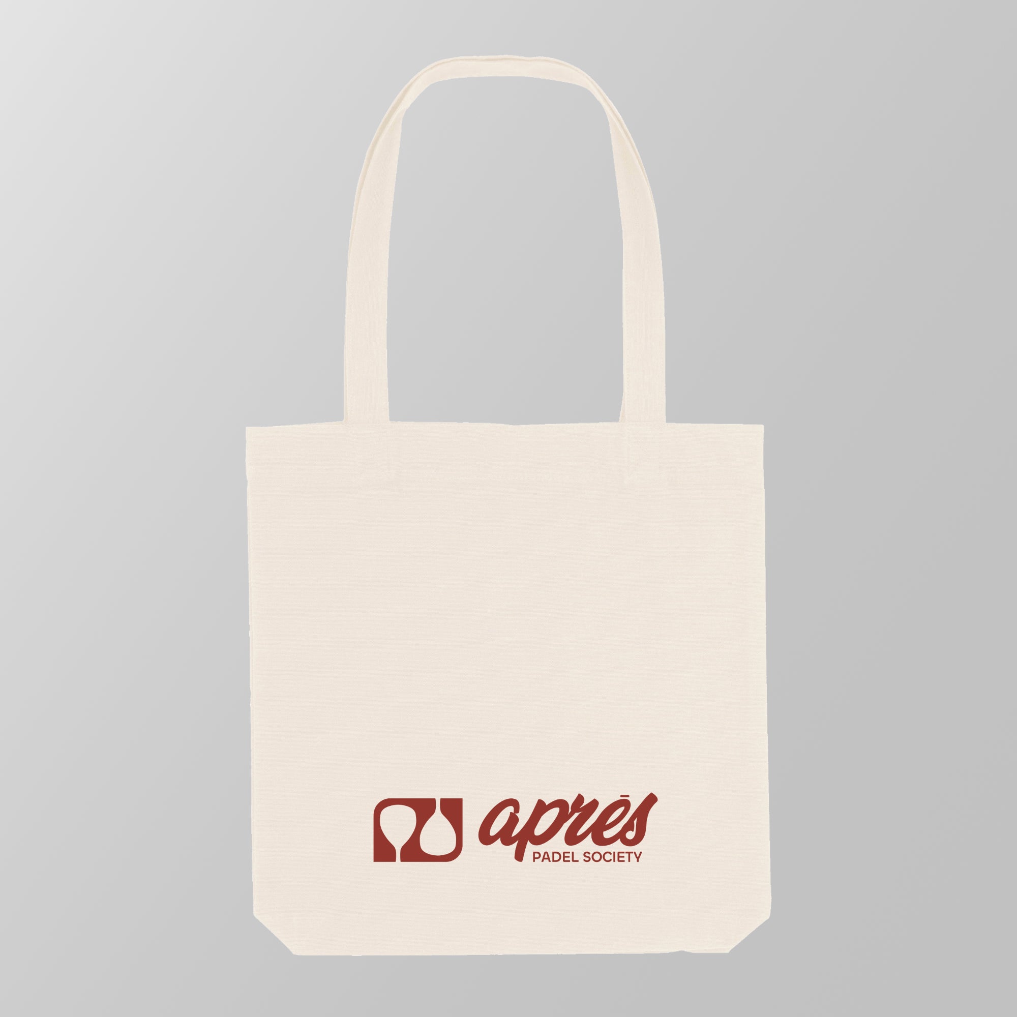 Front view of a premium cream padel tote bag with the red 'Après Padel Society' logo. 