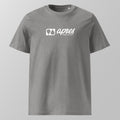 Front view of a heather grey relaxed fit oversized unisex padel t-shirt with a white horizontal 'Après Padel Society' logo on the chest.