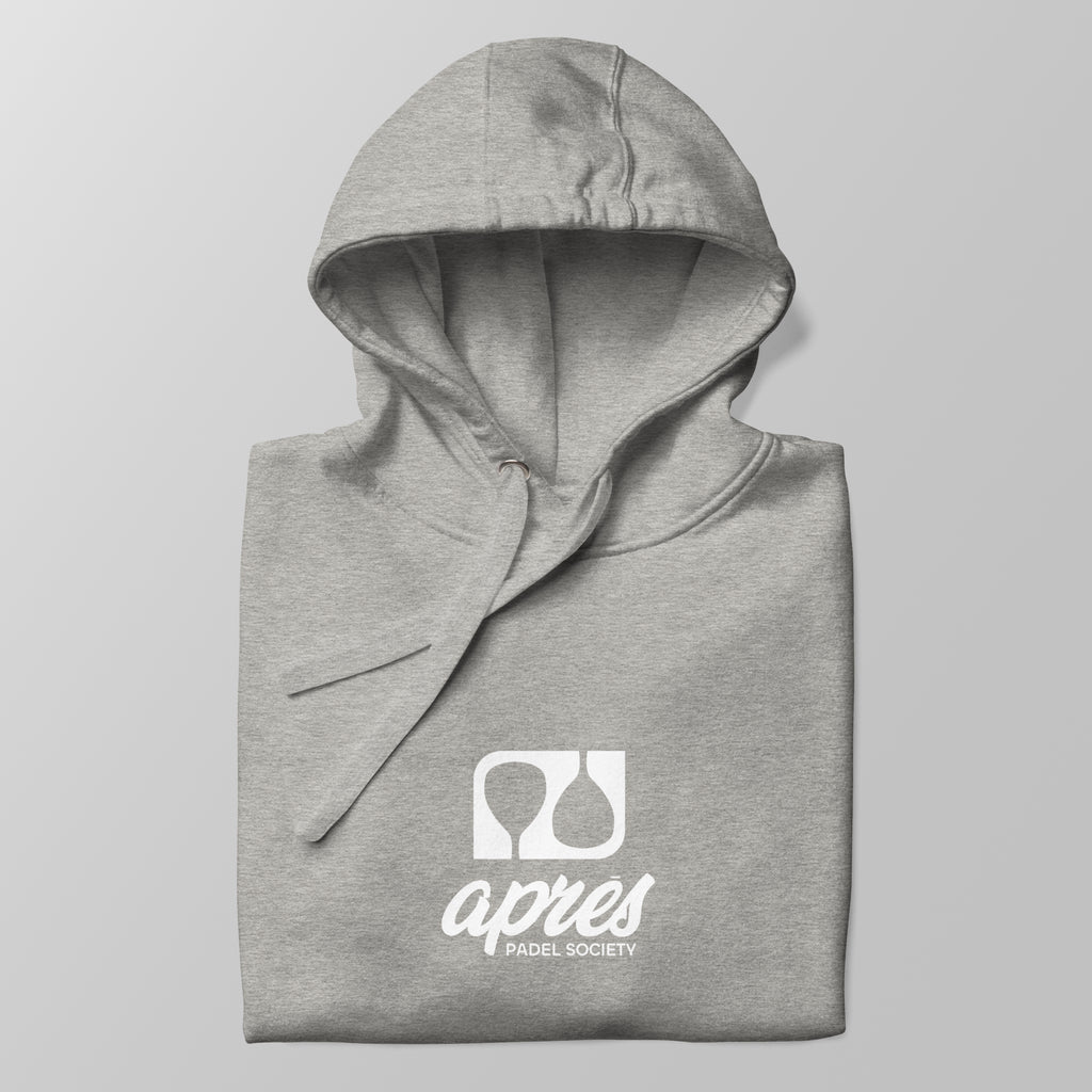 Close-up of a folded heather grey premium padel hoodie with the white 'Après Padel Society' logo centred.