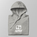 Close-up of a folded heather grey premium padel hoodie with the white 'Après Padel Society' logo centred.