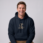 Man modelling a navy blue premium padel hoodie with tan 'Après Padel Society' logo.